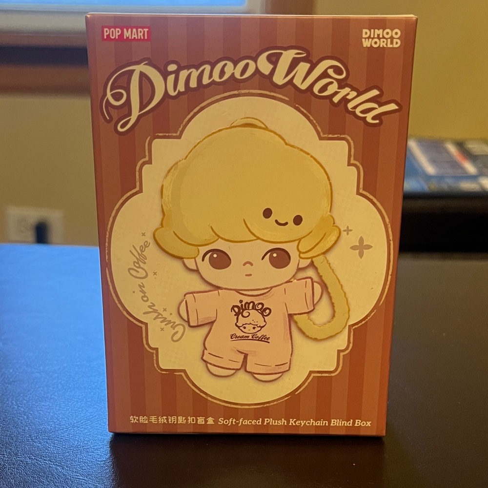 Dimoo World Crush on Coffee Grapefruit Americano soft face plush key chain.